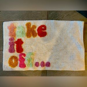 Multi color ‘Take it off…’ bath mat Urban Outfitters